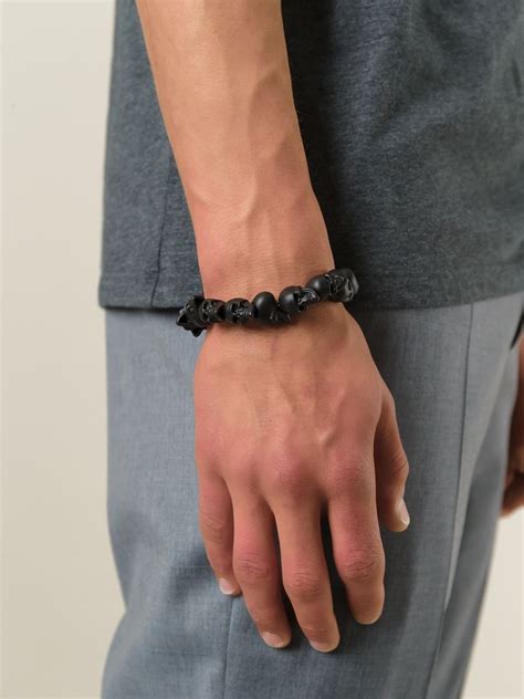 alexander mcqueen mens bracelet|alexander mcqueen skull charm ring.